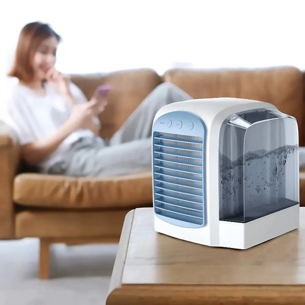 Mini Refrigerator/Air ConditionerExperience the next level of air purification and hydration with our innovative Portable Mini Air Conditioner and Humidifier. With its high-efficiency filter, this dGenki Essentials Genki Essentials Mini Refrigerator/Air Conditioner